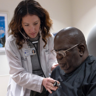 healthcare professional checking vitals