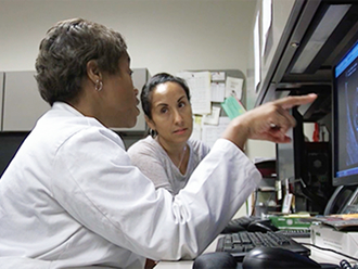 healthcare professionals working at computer